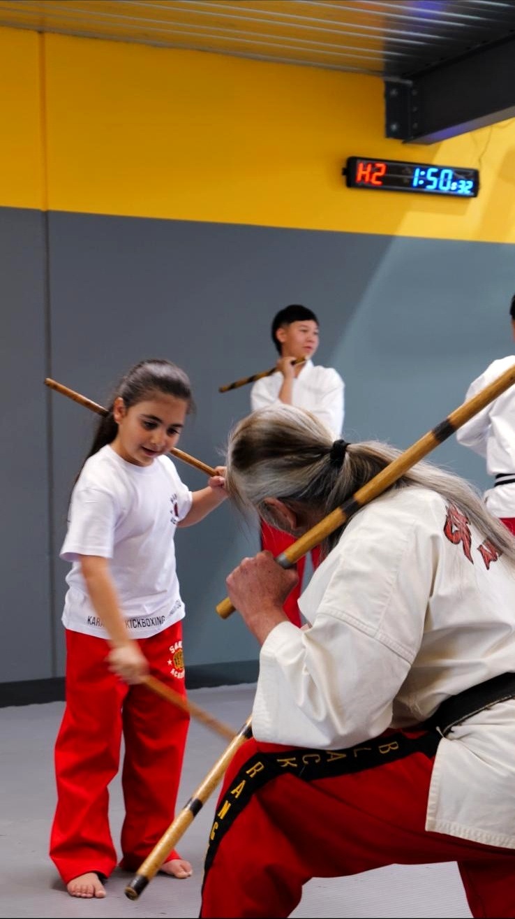 SAMA instructor guiding a student through a training exercise